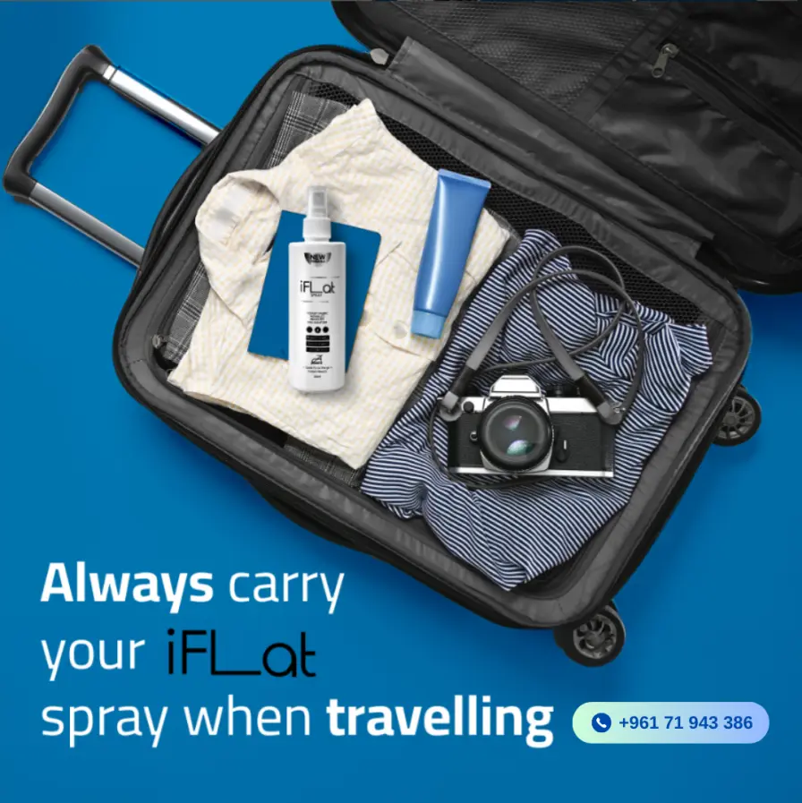 Travel Essentials in an Open Suitcase | Discover the Benefits of Travel Spray Open suitcase filled with clothes, toiletries, and a camera, featuring text about a travel spray